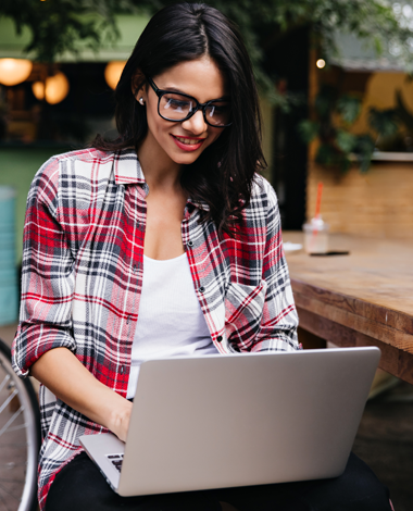 Woman studying on laptop